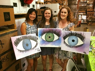 Kendra Weiler, center, a third-year student at PUCO, at a painting class at a local winery with classmates.