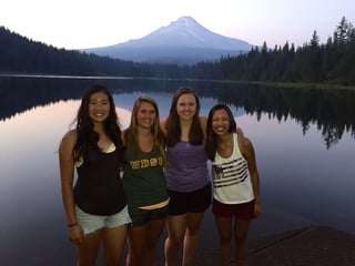 Kendra Weiler, second from right, and friends from PUCO during a camping trip to Trillium Lake near Mt. Hood in Oregon.